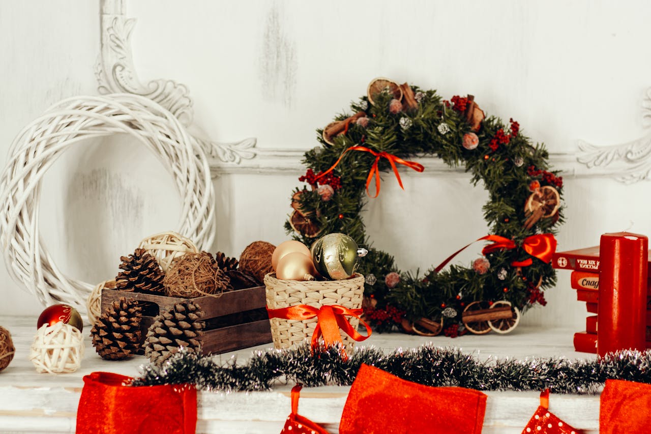 Stylish Christmas decorations featuring wreaths, pine cones, and ornaments.